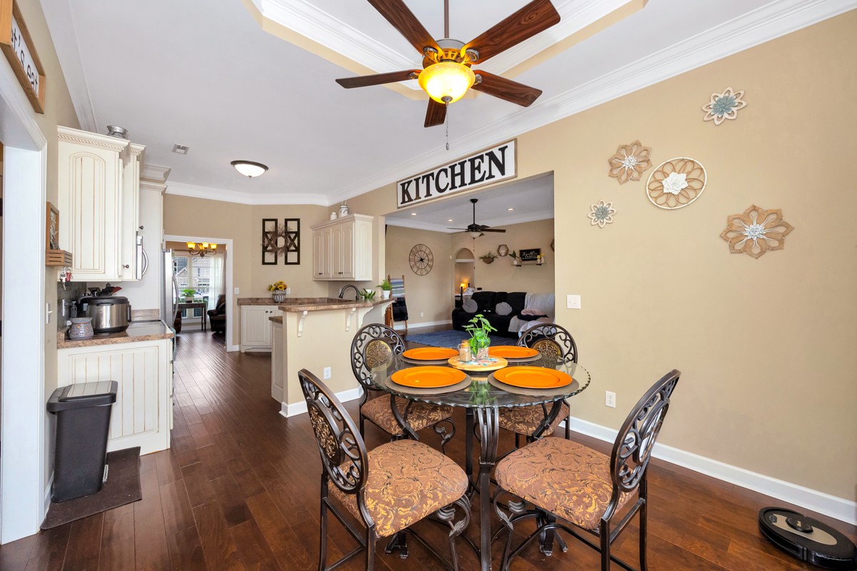 402 Vista Shores Road Rogersville, AL 35652 - Photo 16 of 55 a dining room with furniture and wooden floor