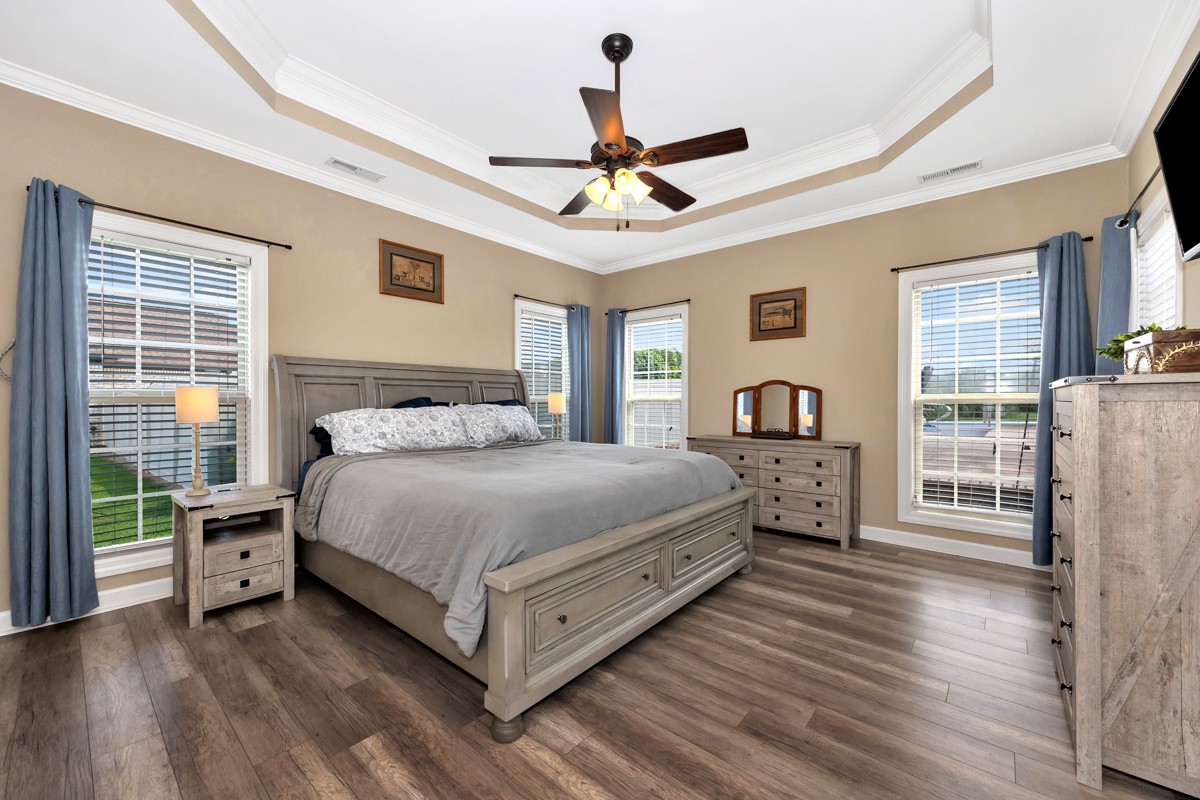 402 Vista Shores Road Rogersville, AL 35652 - Photo 27 of 55 a bedroom with a large bed and a window