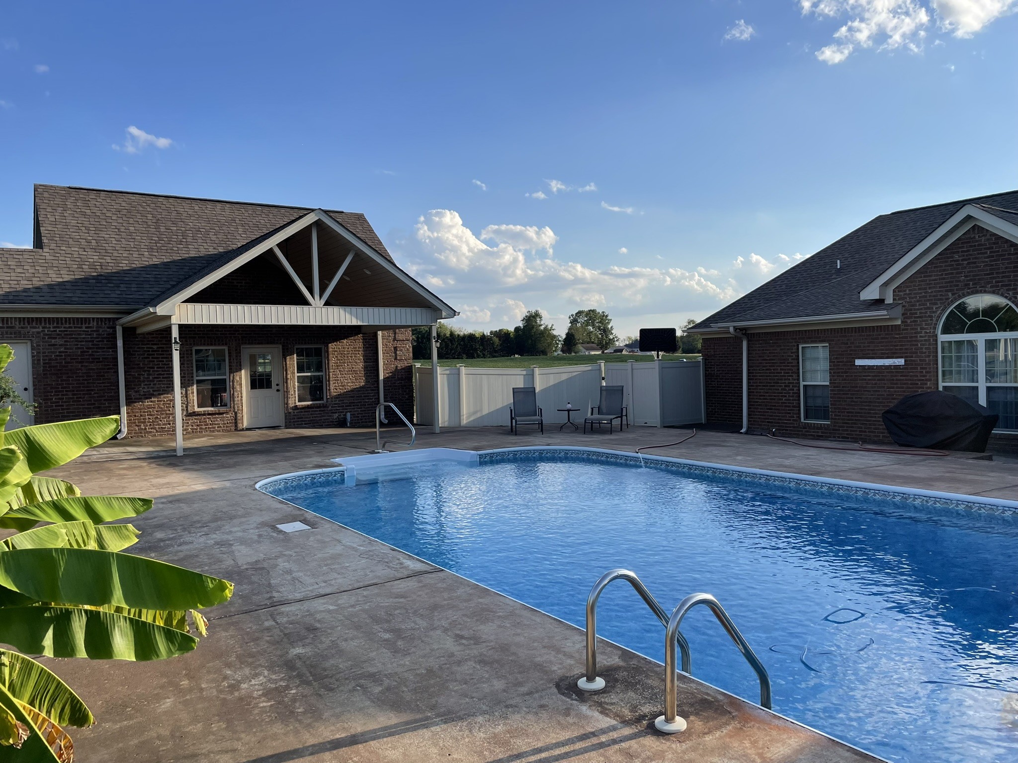 402 Vista Shores Road Rogersville, AL 35652 - Photo 41 of 55 a view of a house with swimming pool and sitting area