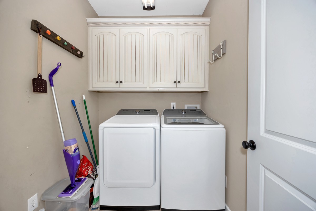 402 Vista Shores Road Rogersville, AL 35652 - Photo 48 of 55 a utility room with dryer and washer