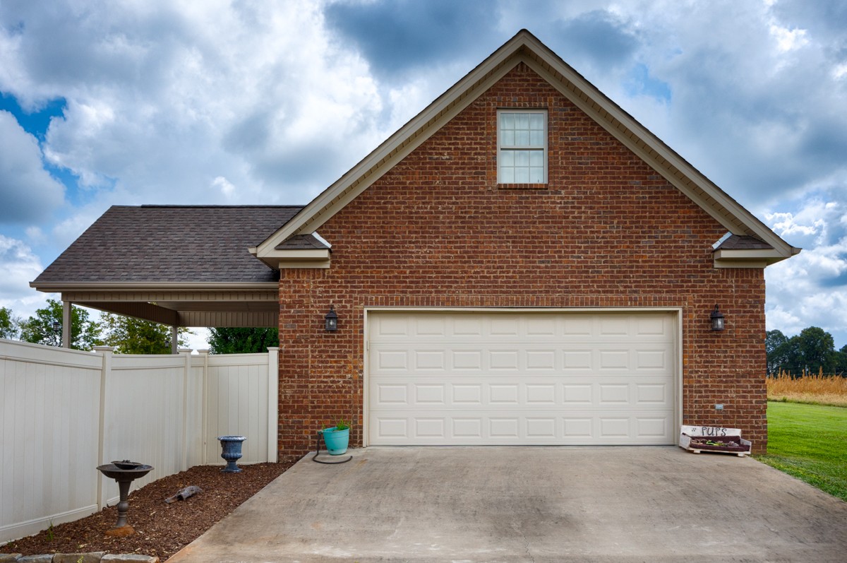 402 Vista Shores Road Rogersville, AL 35652 - Photo 49 of 55 a front view of a house with a garage
