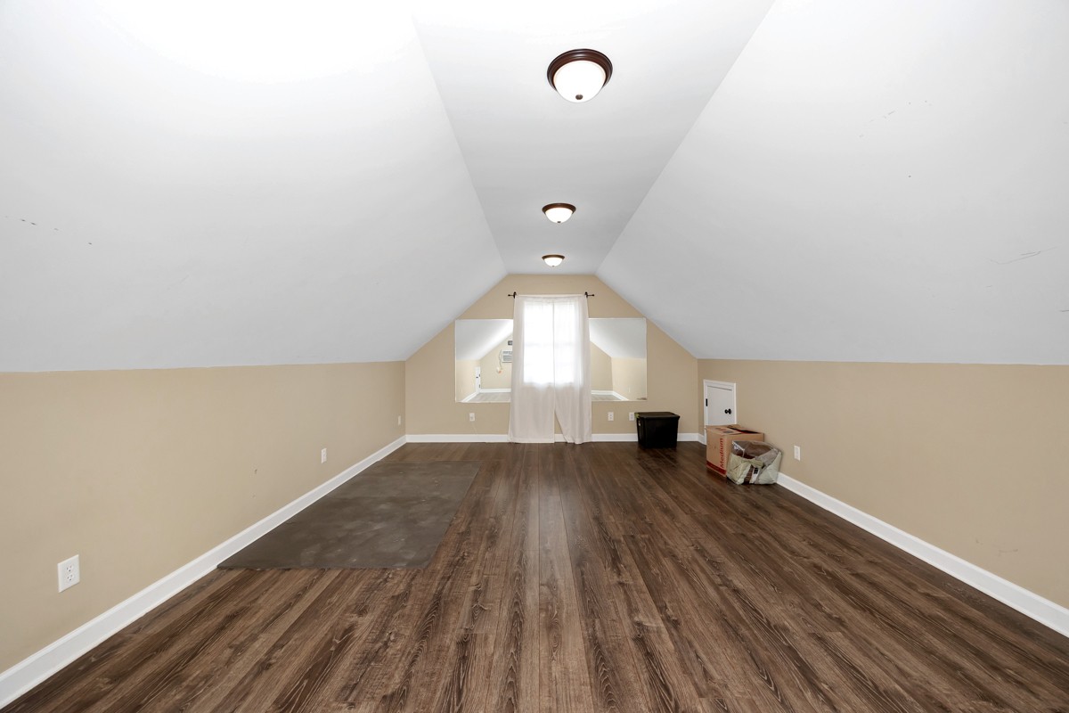 402 Vista Shores Road Rogersville, AL 35652 - Photo 50 of 55 an empty room with wooden floor and windows