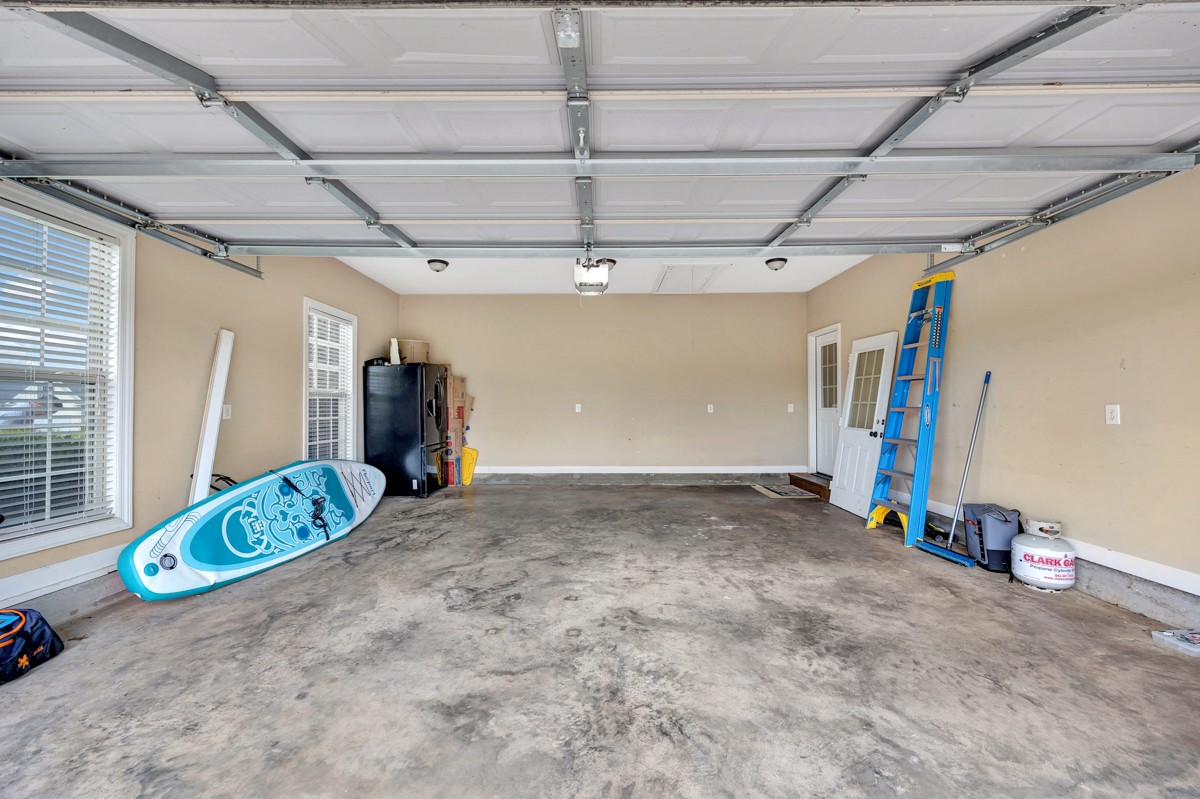 402 Vista Shores Road Rogersville, AL 35652 - Photo 51 of 55 a view of a room with furniture and a ceiling fan