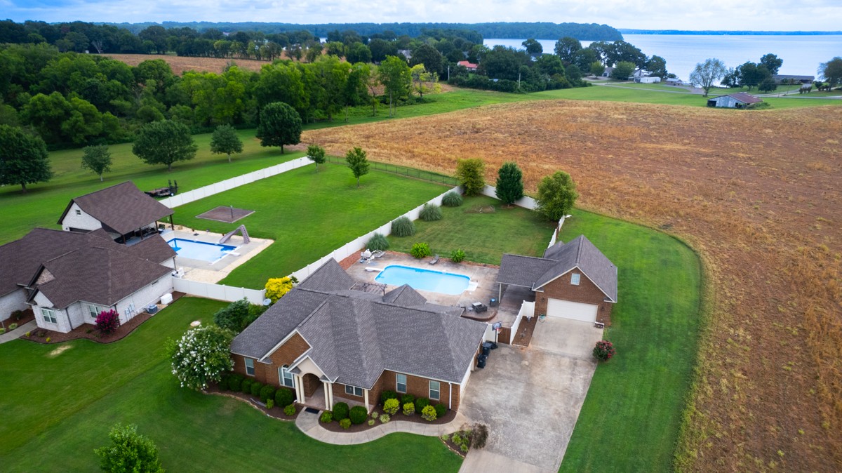 402 Vista Shores Road Rogersville, AL 35652 - Photo 53 of 55 an aerial view of a house with garden space and street view