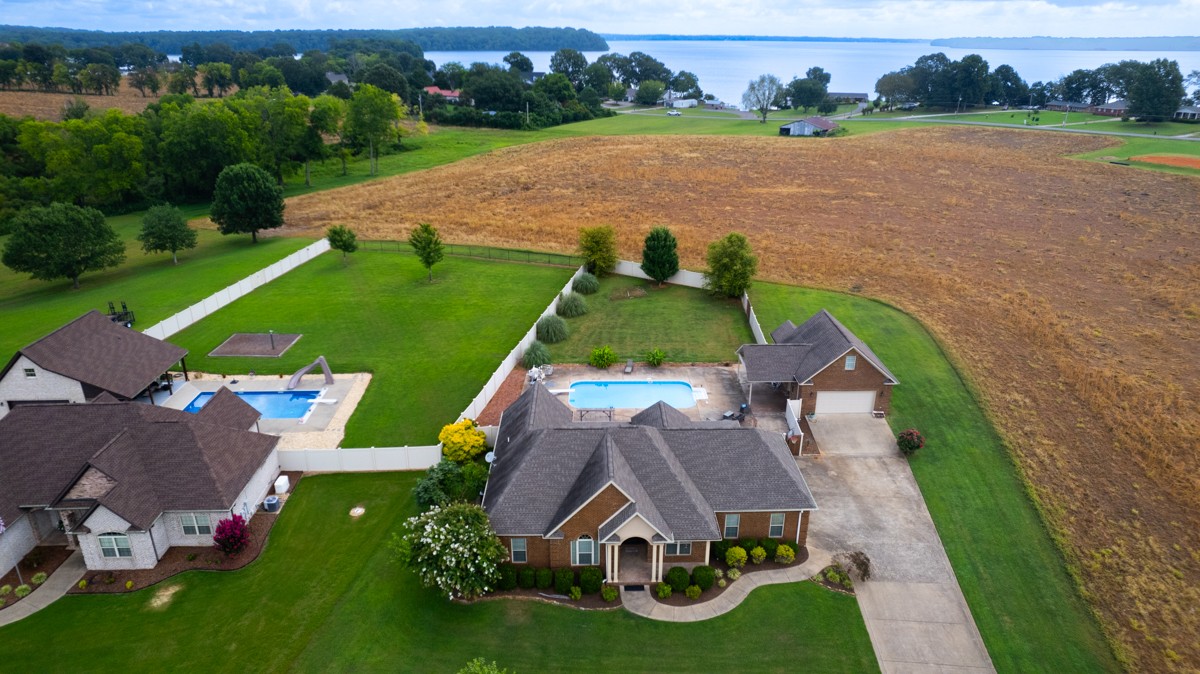 402 Vista Shores Road Rogersville, AL 35652 - Photo 54 of 55 an aerial view of a house with garden space and lake view