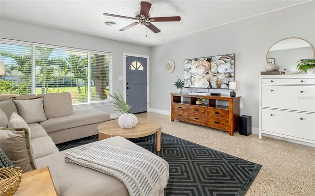 a bedroom with furniture and windows