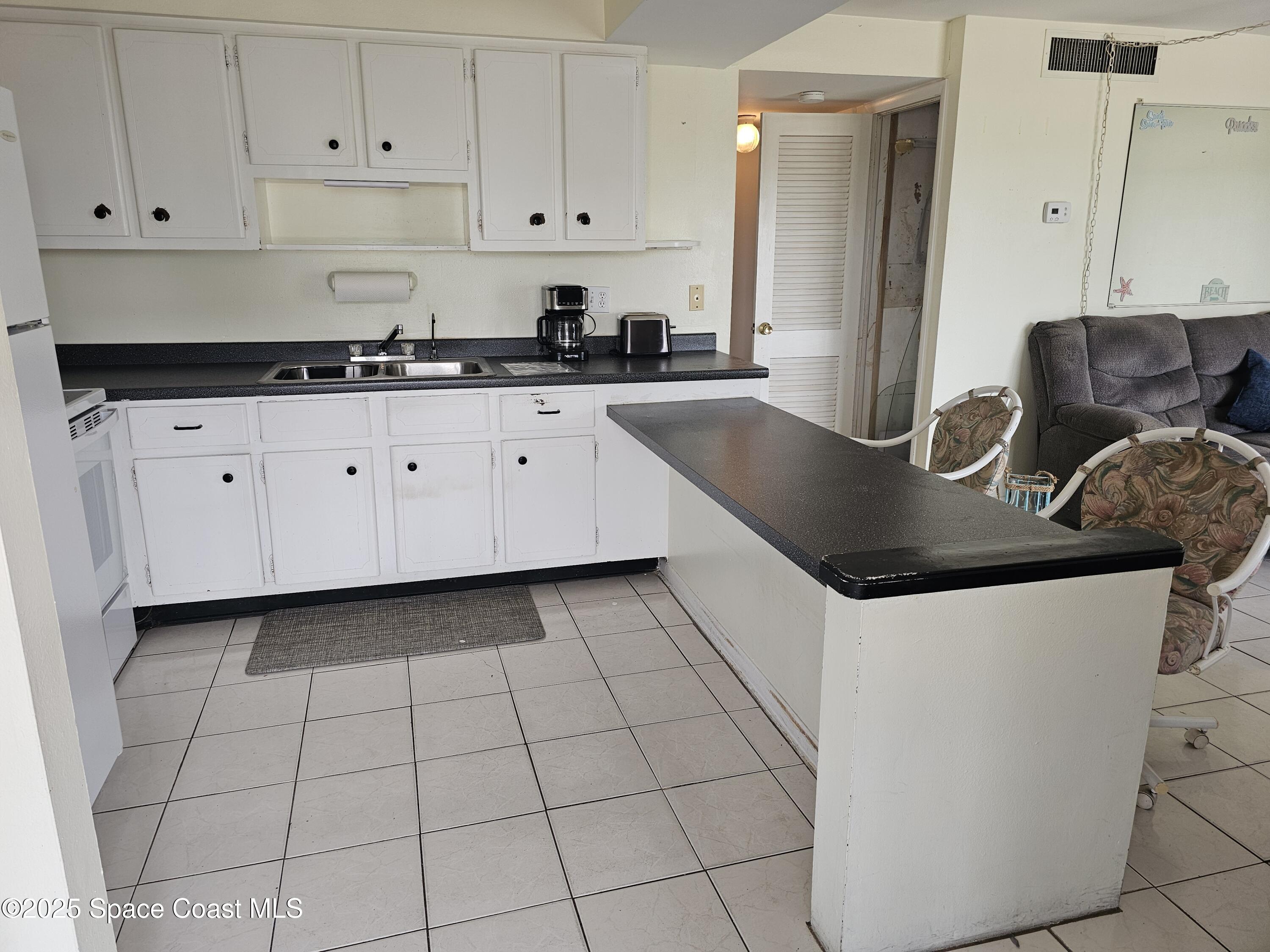 3601 Ocean Beach Boulevard, Unit 8 Cocoa Beach, FL 32931 - Photo 17 of 36 20250714_114103