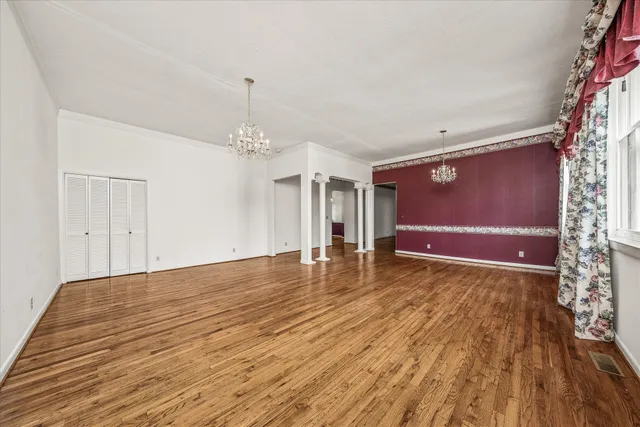 a bathroom with a sink vanity mirror and toilet