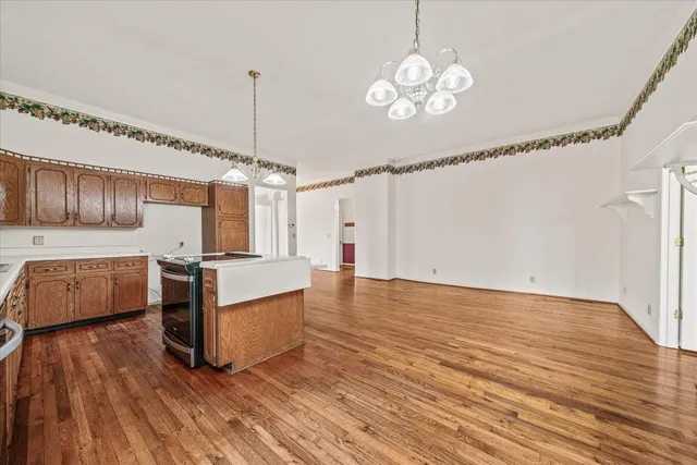 a view of a livingroom with furniture and a window