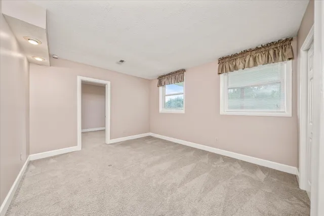 a view of a golf course with a park