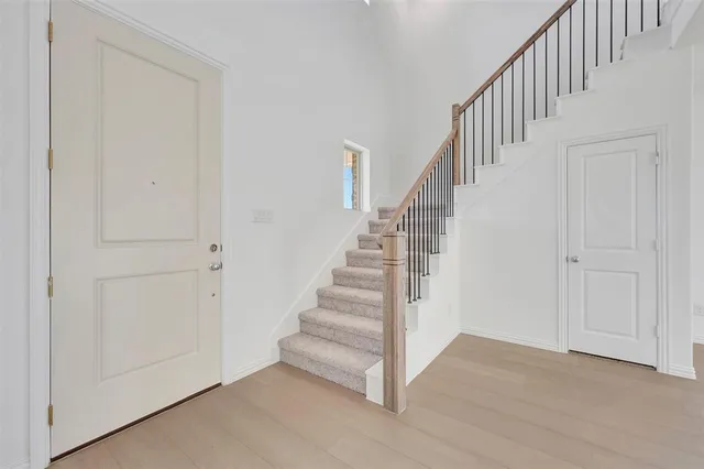 a view of entryway with stairs