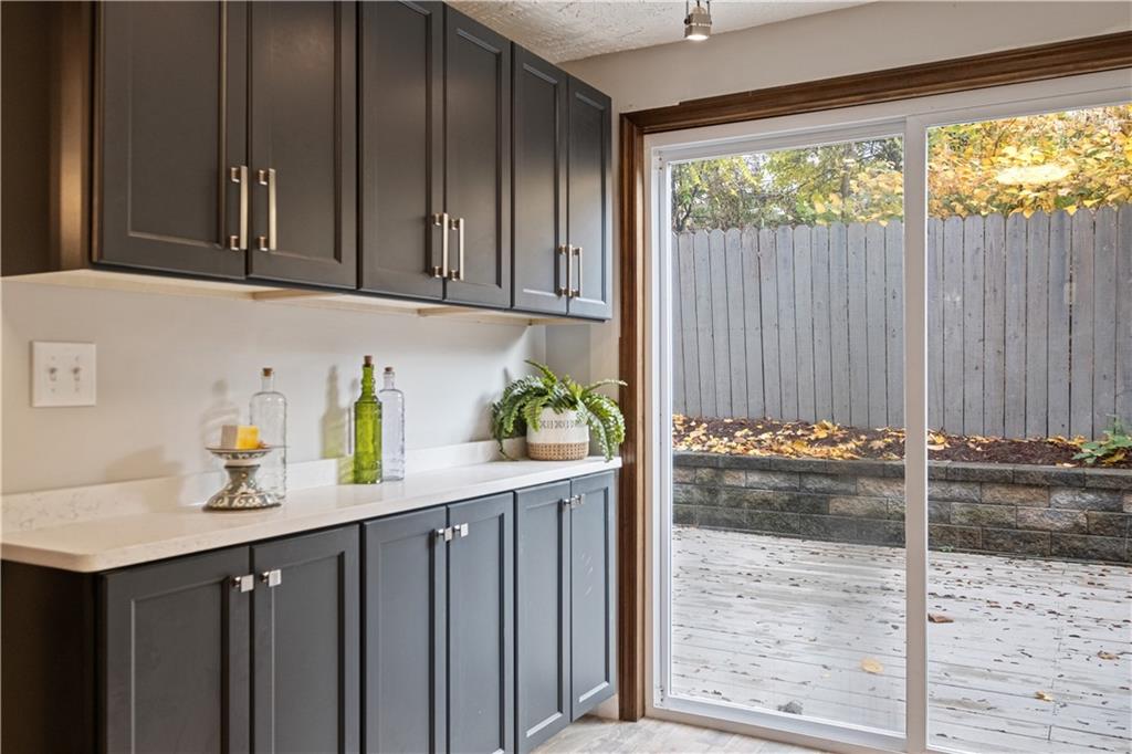 179 Merrimac Street Pittsburgh, PA 15211 - Photo 17 of 37 a kitchen with a window a sink and cabinets