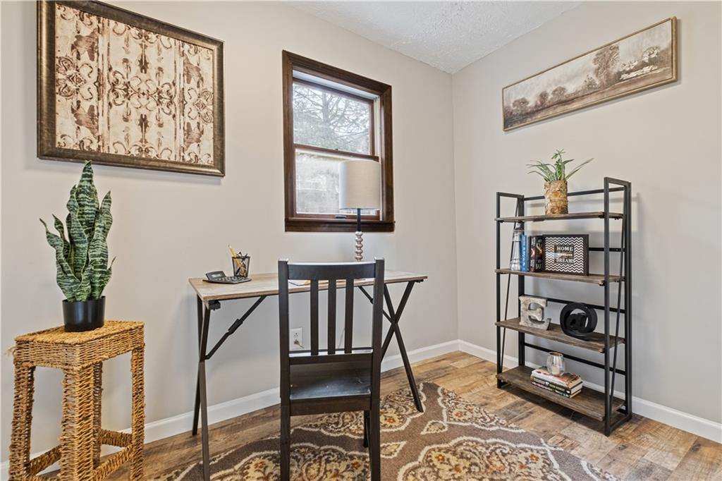 179 Merrimac Street Pittsburgh, PA 15211 - Photo 23 of 37 a view of a livingroom with furniture and windows
