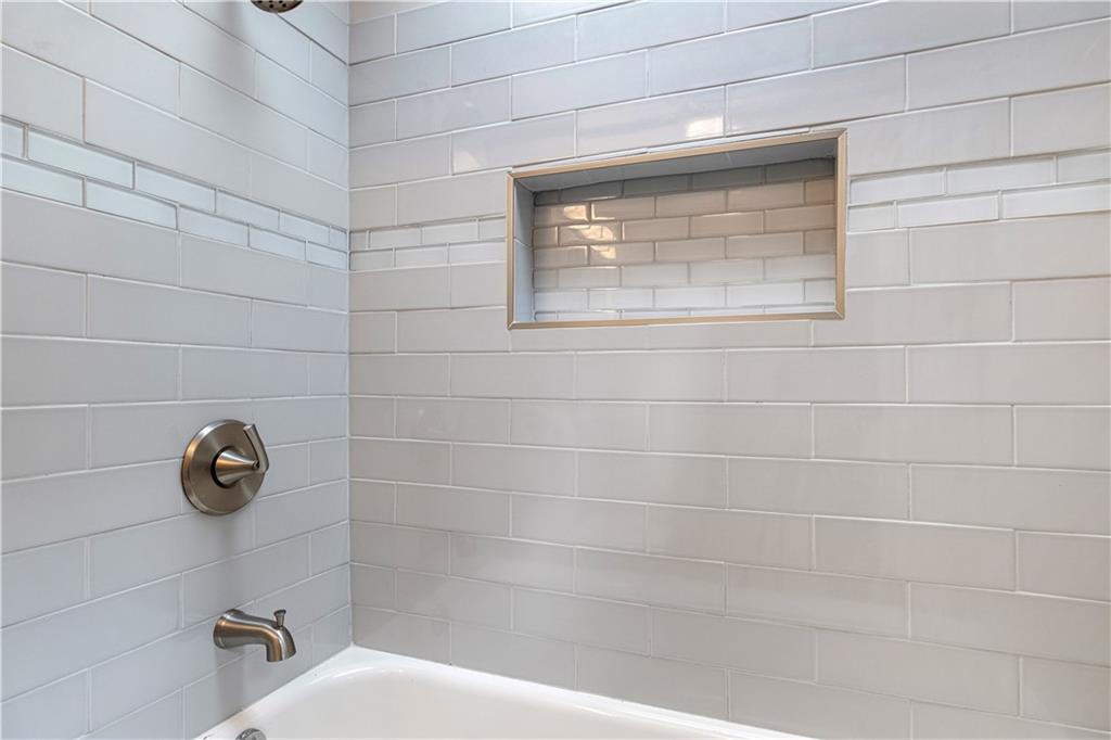 179 Merrimac Street Pittsburgh, PA 15211 - Photo 25 of 37 a bathroom with a sink and a window