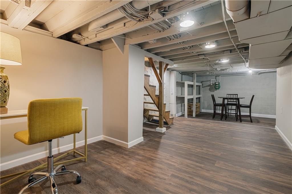 179 Merrimac Street Pittsburgh, PA 15211 - Photo 28 of 37 a view of a room with wooden floor furniture and windows