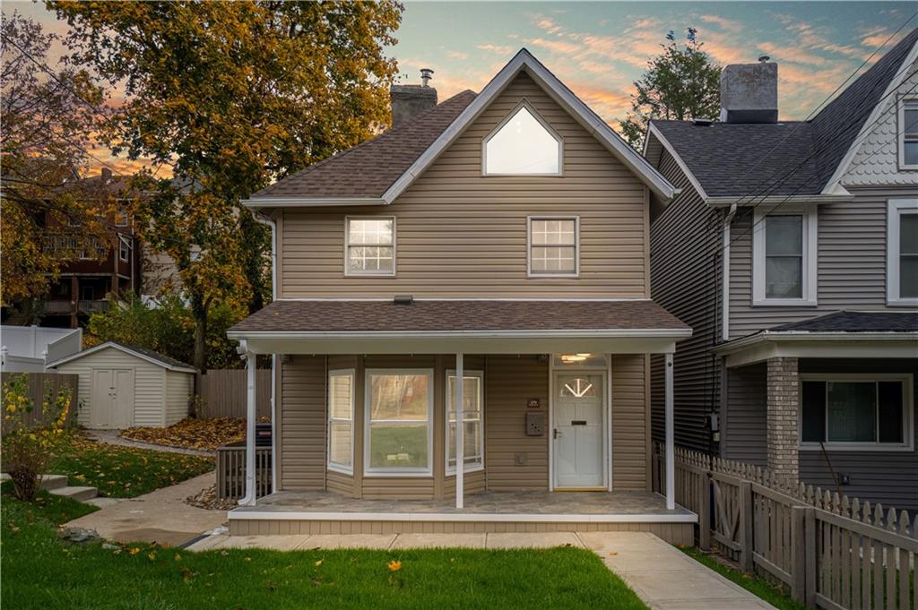 179 Merrimac Street Pittsburgh, PA 15211 - Photo 37 of 37 a front view of a house with a yard