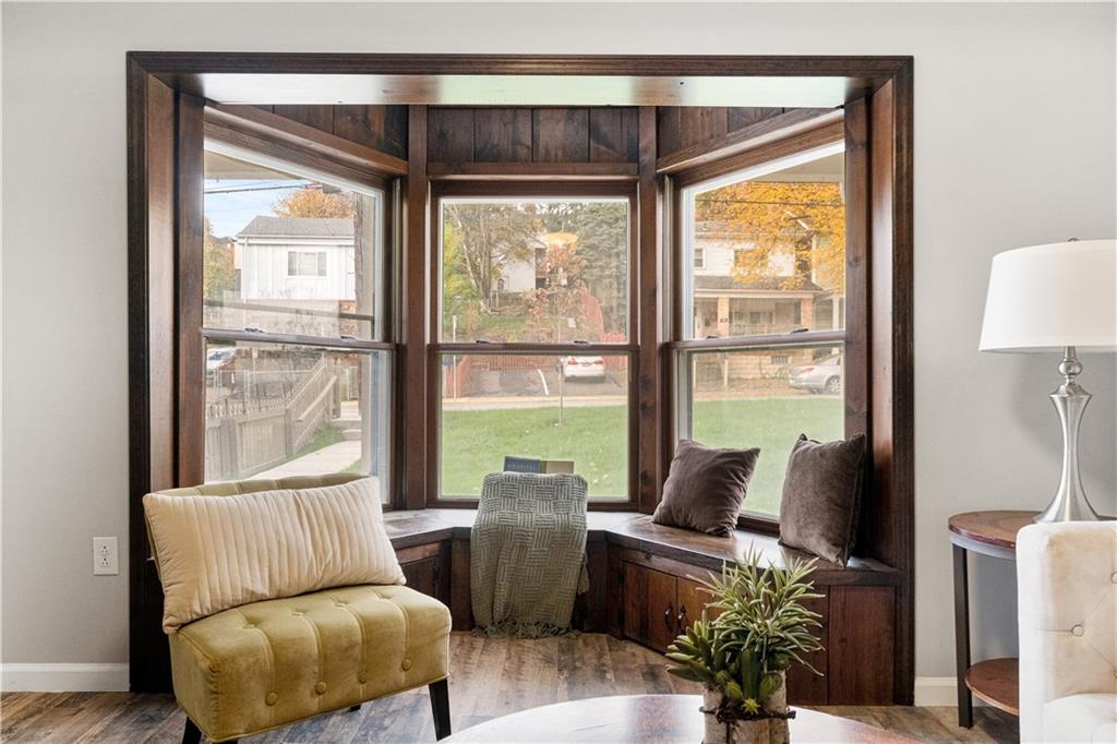 179 Merrimac Street Pittsburgh, PA 15211 - Photo 10 of 37 a living room with furniture and a window
