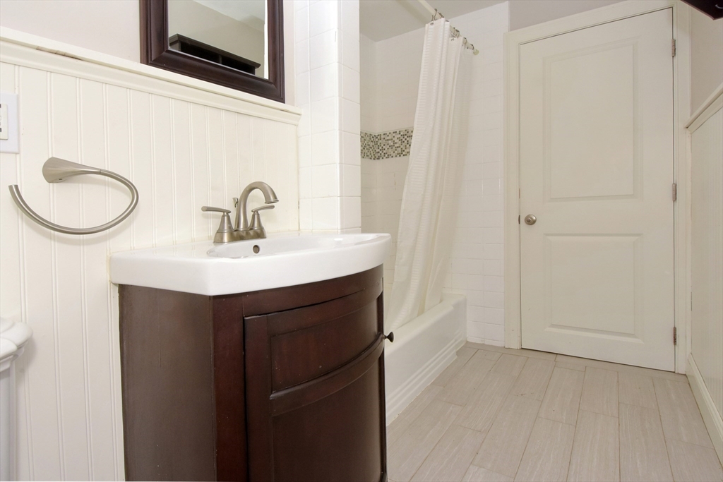 4 Allen Lane Ipswich, MA 01938 - Photo 16 of 30 a bathroom with a sink and a mirror