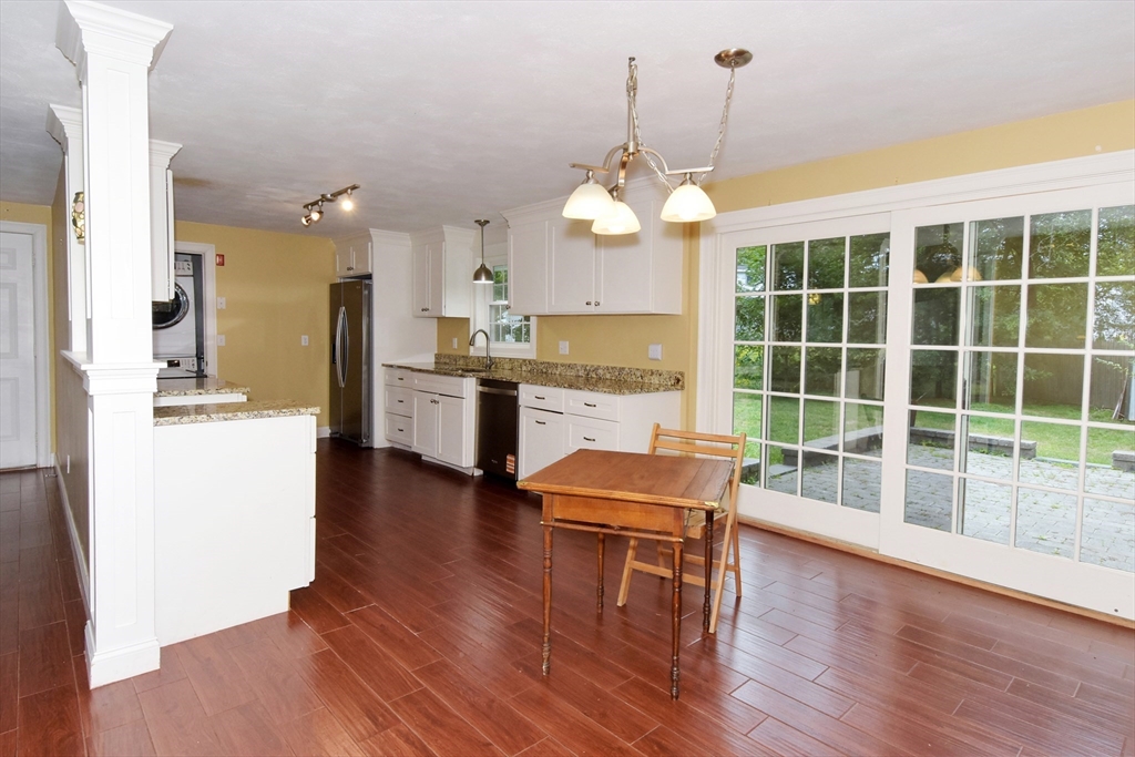 4 Allen Lane Ipswich, MA 01938 - Photo 6 of 30 a view of a dining room with furniture a chandelier and wooden floor