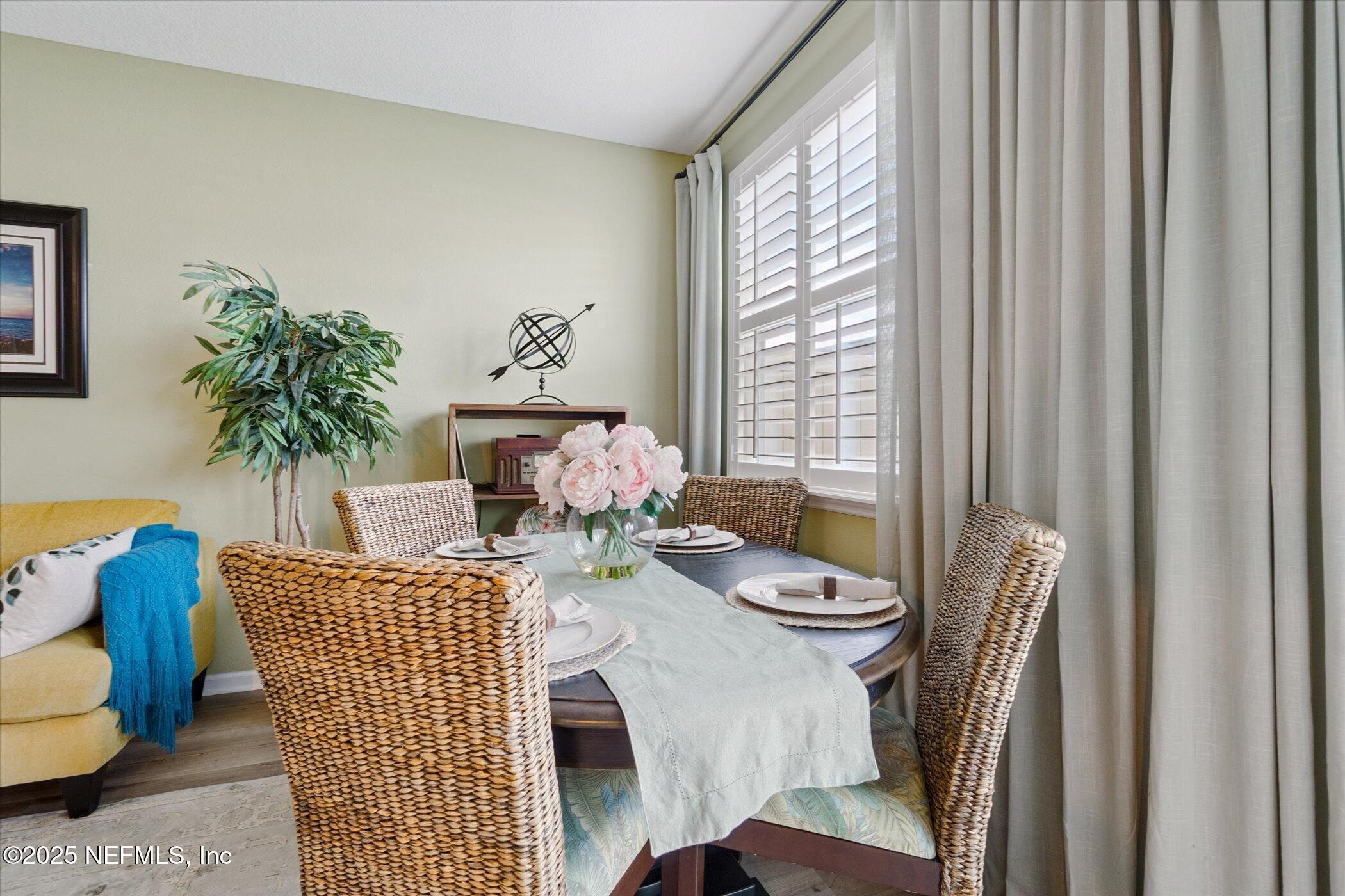 7821 Merchants Way Jacksonville, FL 32222 - Photo 16 of 35 a view of a dining room with furniture and window