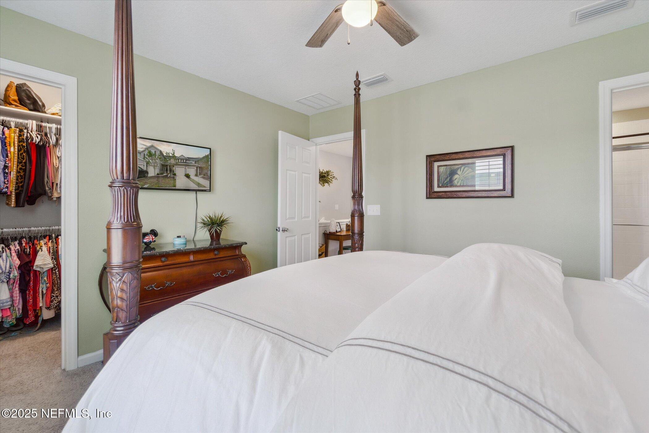 7821 Merchants Way Jacksonville, FL 32222 - Photo 19 of 35 a bedroom with bed and furniture