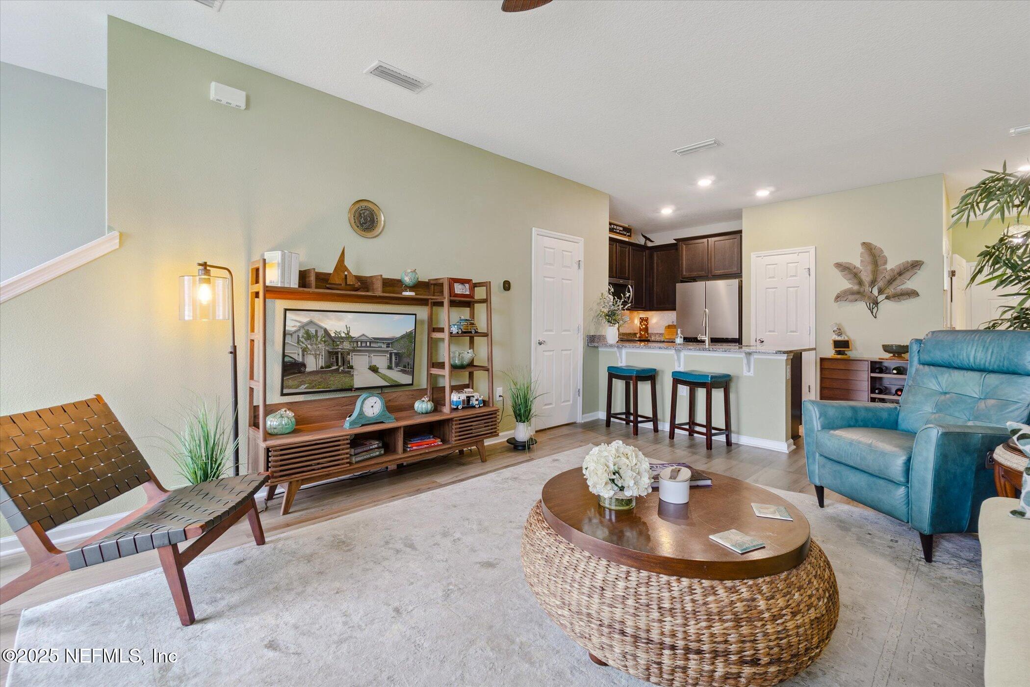 7821 Merchants Way Jacksonville, FL 32222 - Photo 2 of 35 a living room with furniture and a table