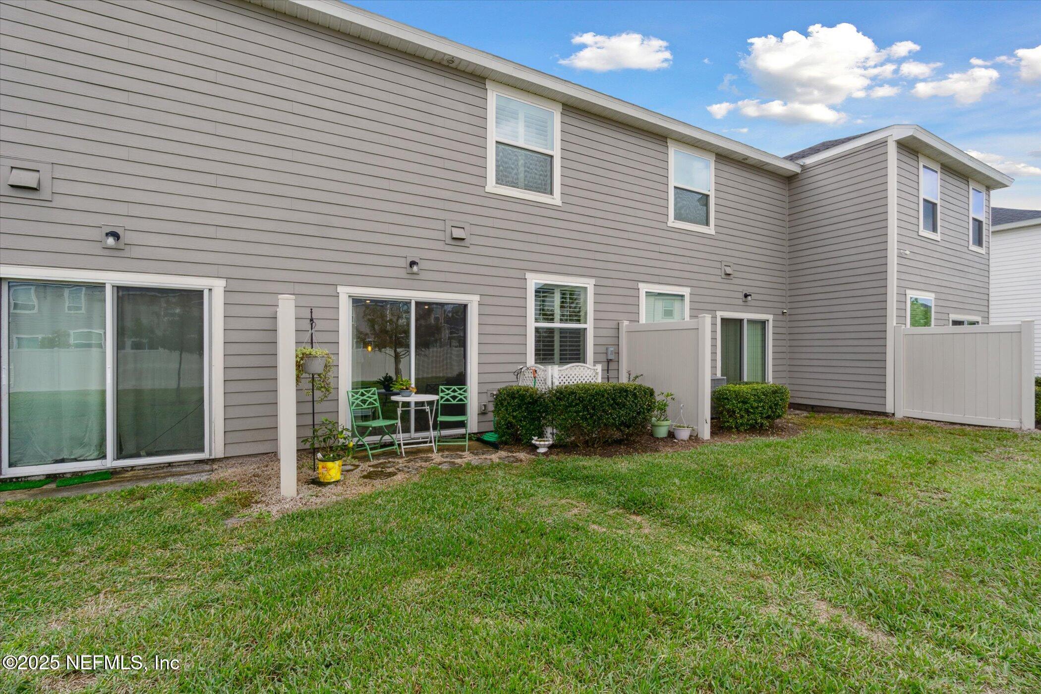 7821 Merchants Way Jacksonville, FL 32222 - Photo 29 of 35 a view of backyard with a garden and plants