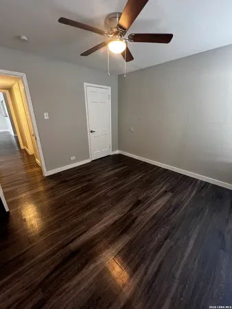 a view of room with hardwood floor