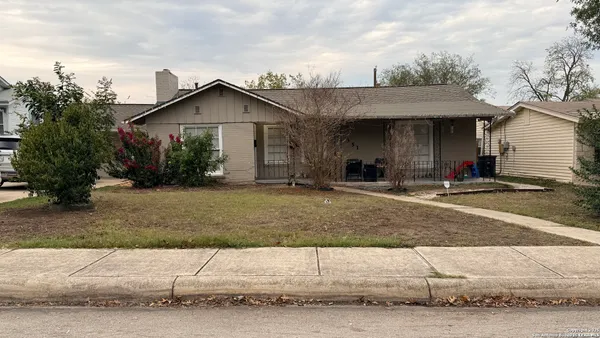a front view of a house with garage