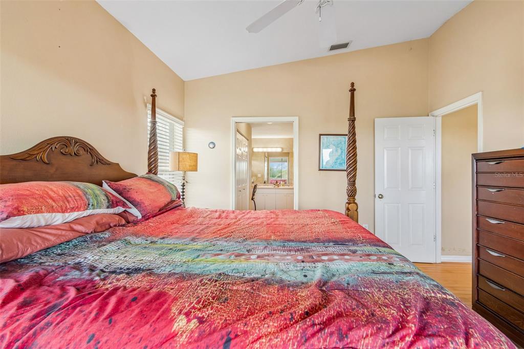 119 Burns Road Terra Ceia, FL 34250 - Photo 40 of 100 a bedroom with a bed and a dresser
