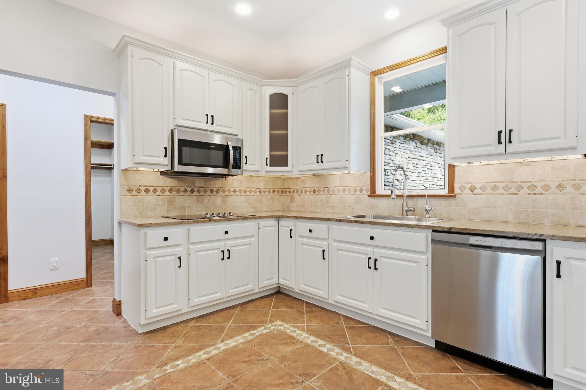 1669 Fennel Road Quakertown, PA 18951 - Photo 14 of 68 Kitchen with stainless steel appliances & cooktop
