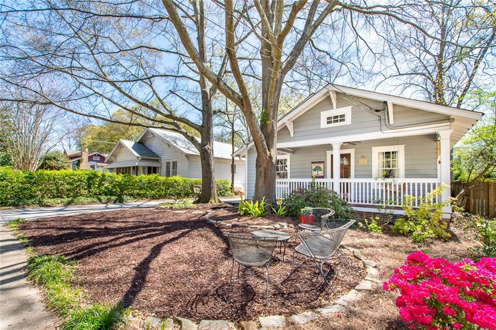 308 Spring Street Decatur, GA 30030 - Photo 1 of 1 a front view of a house with garden