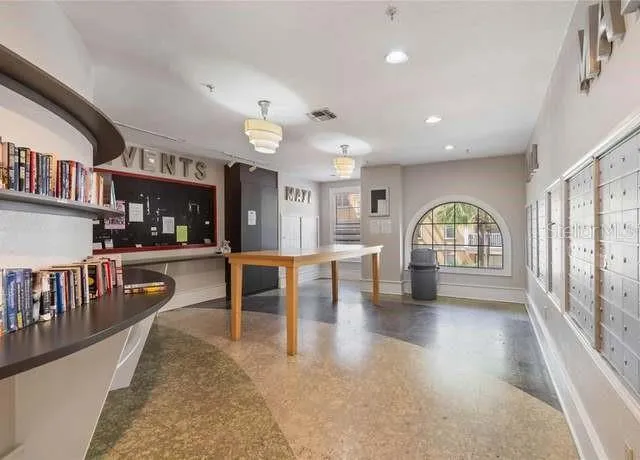 a kitchen with a sink and a stove top oven