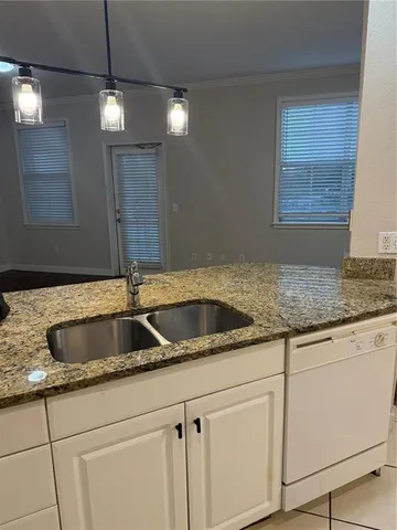 a view of a living room and window
