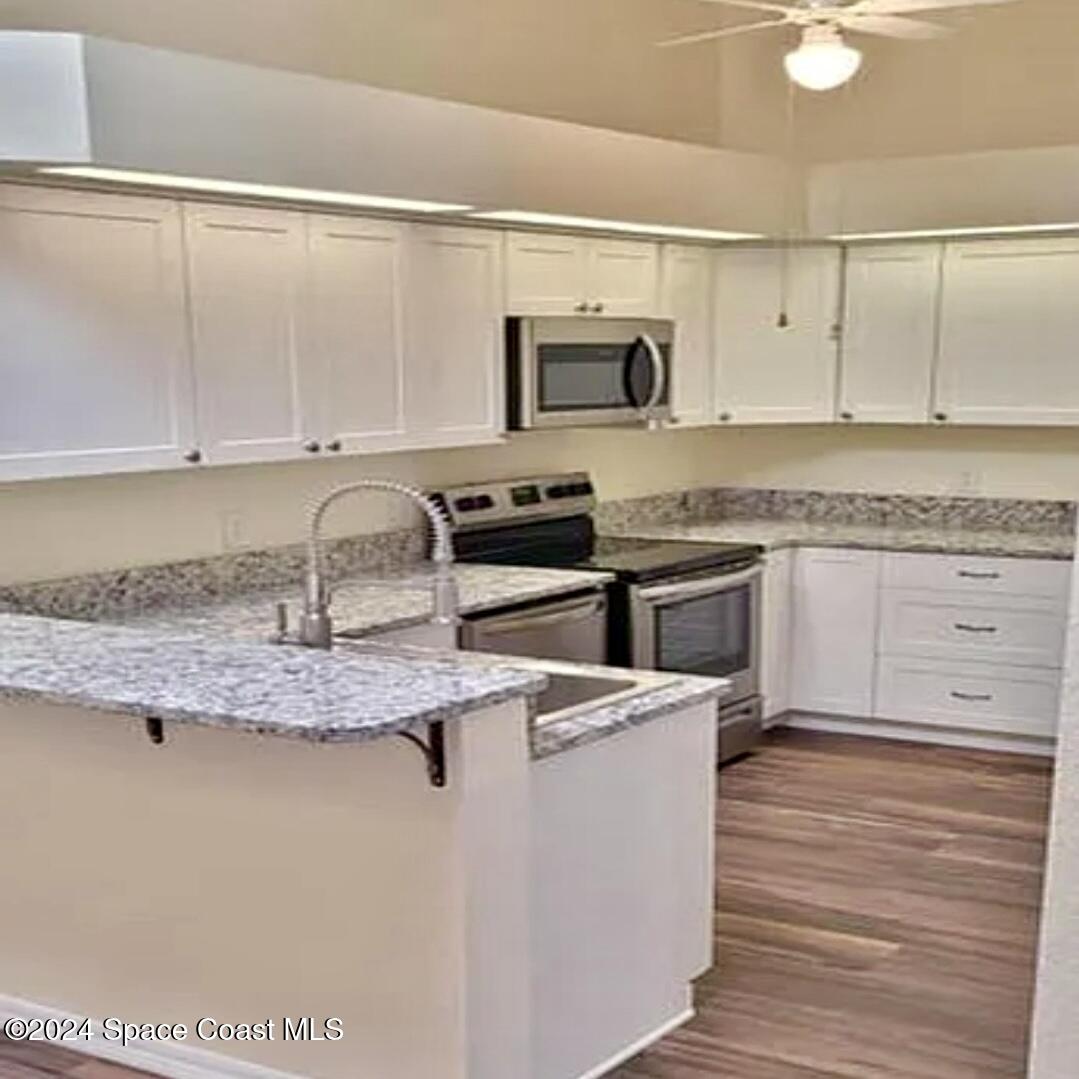 1920 Quail Ridge Court, Unit 2101 Cocoa, FL 32926 - Photo 33 of 50 Granite Kitchen