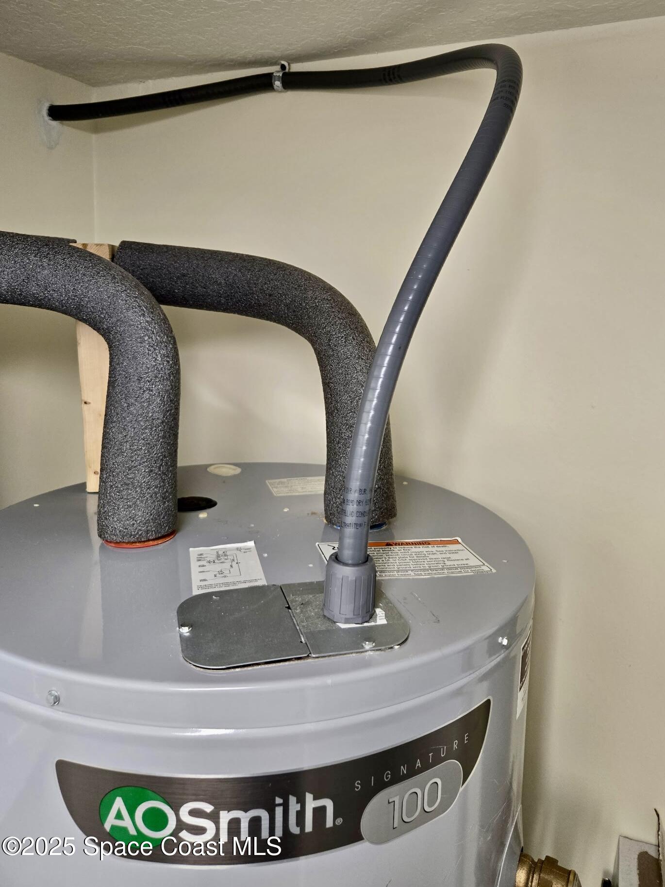 1920 Quail Ridge Court, Unit 2101 Cocoa, FL 32926 - Photo 34 of 50 Full-sized Water Heater