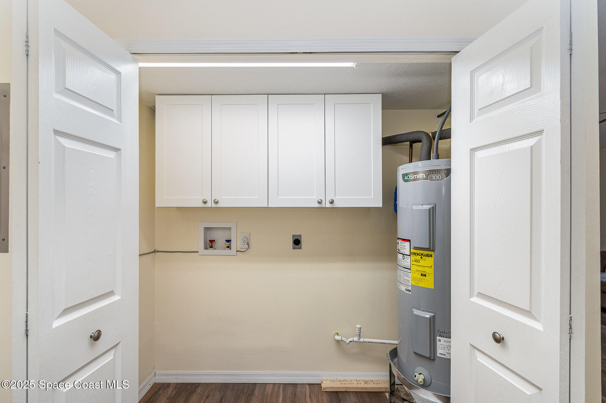 Laundry, Full sized water heater