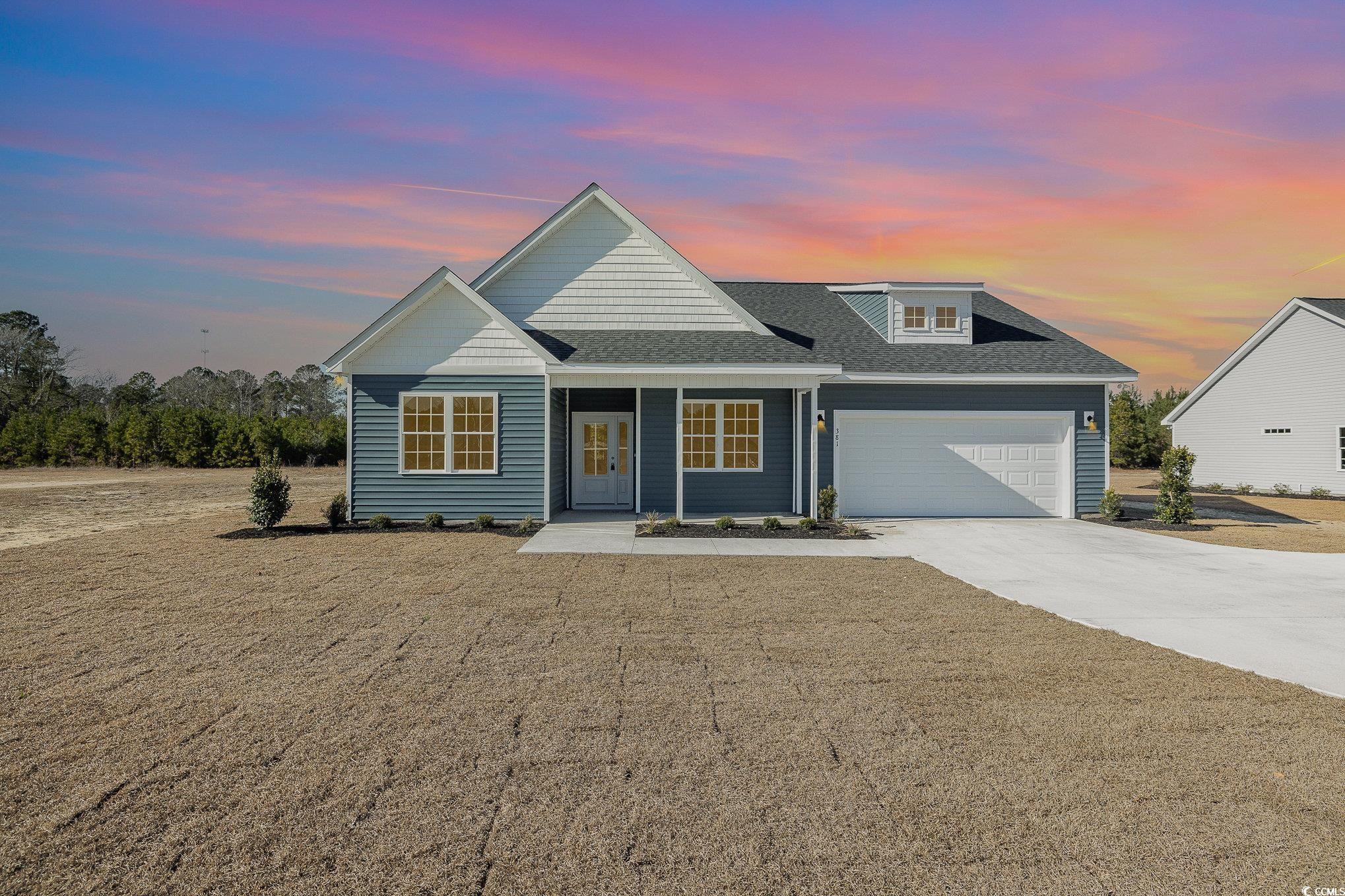 381 Log Cabin Road Loris, SC 29569 - Photo 1 of 35 View of front of property with a garage