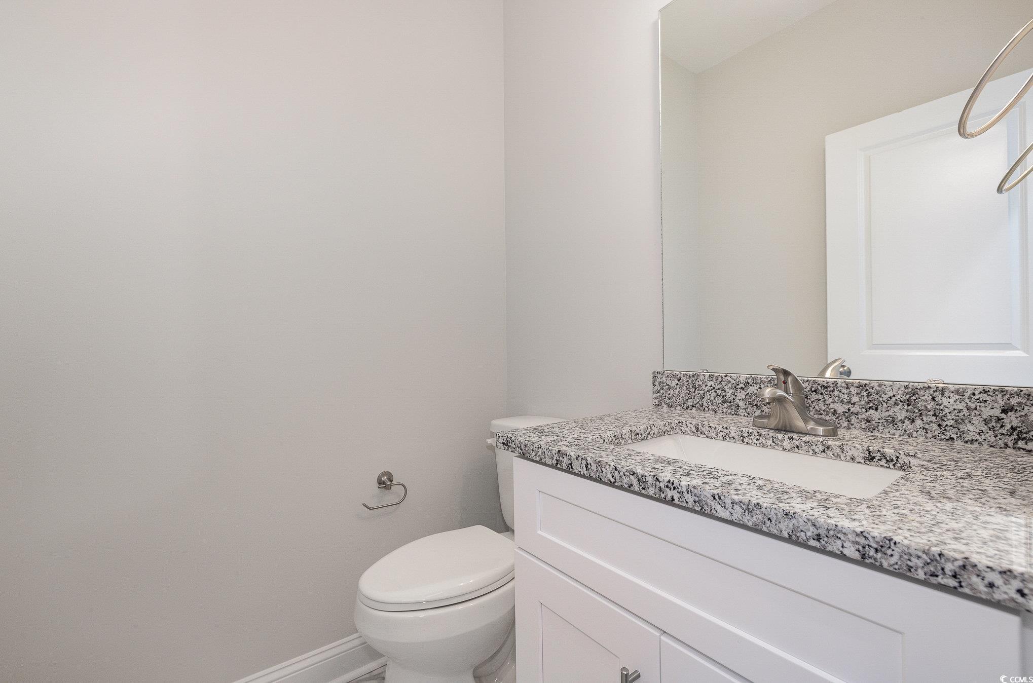 381 Log Cabin Road Loris, SC 29569 - Photo 16 of 35 Bathroom with vanity and toilet