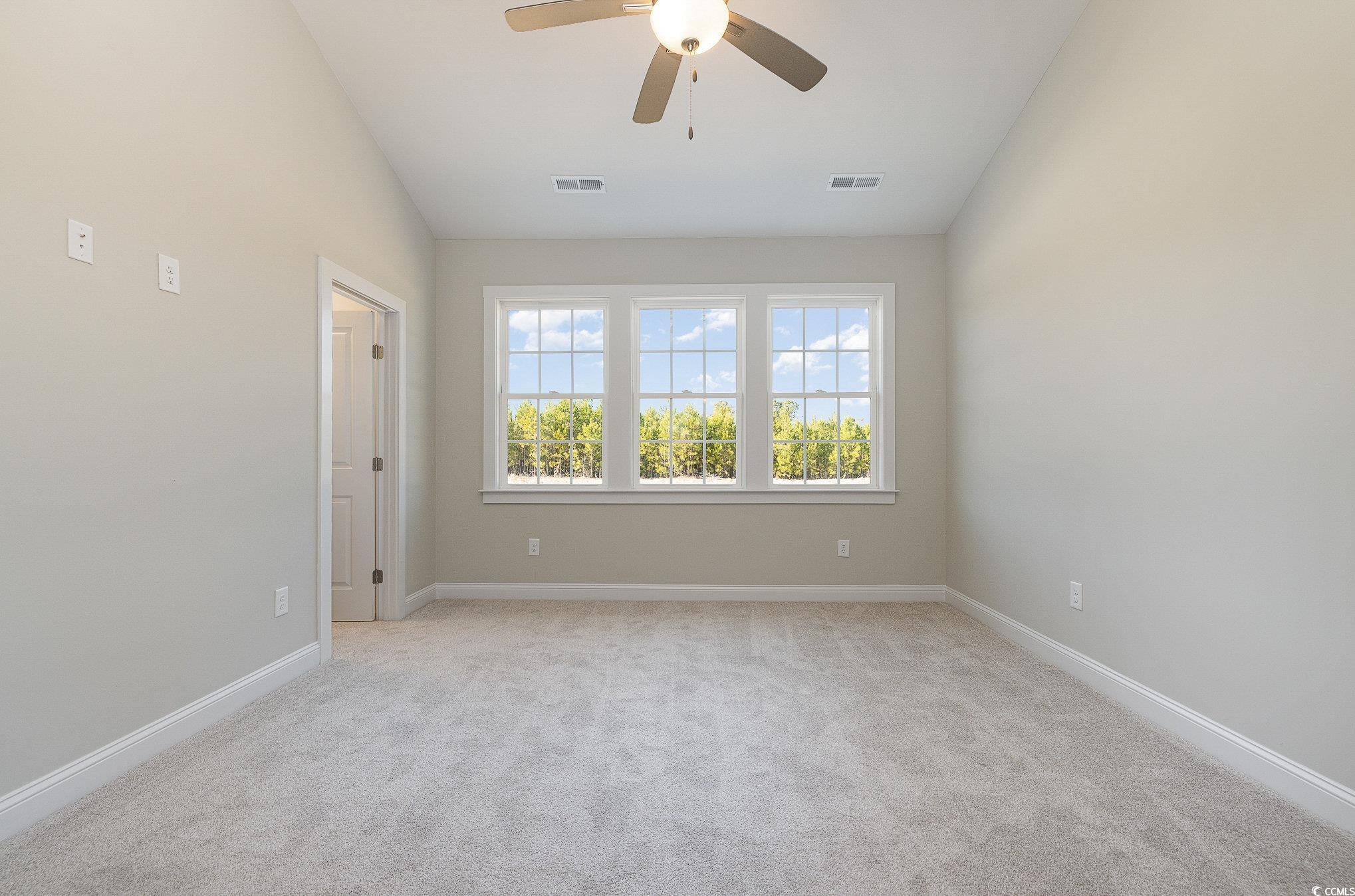 381 Log Cabin Road Loris, SC 29569 - Photo 19 of 35 Unfurnished room with ceiling fan, lofted ceiling,