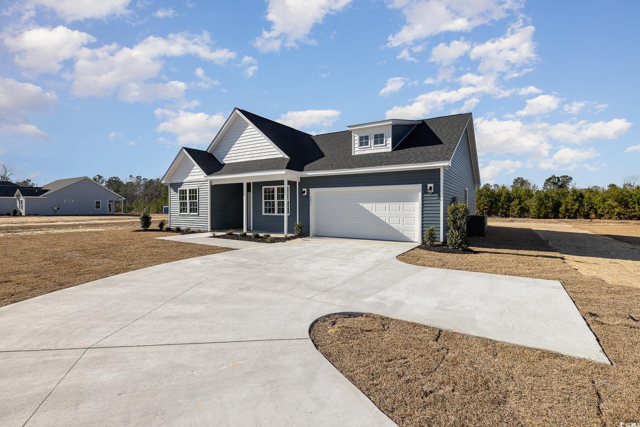 381 Log Cabin Road Loris, SC 29569 - Photo 3 of 35 View of front of house with a garage