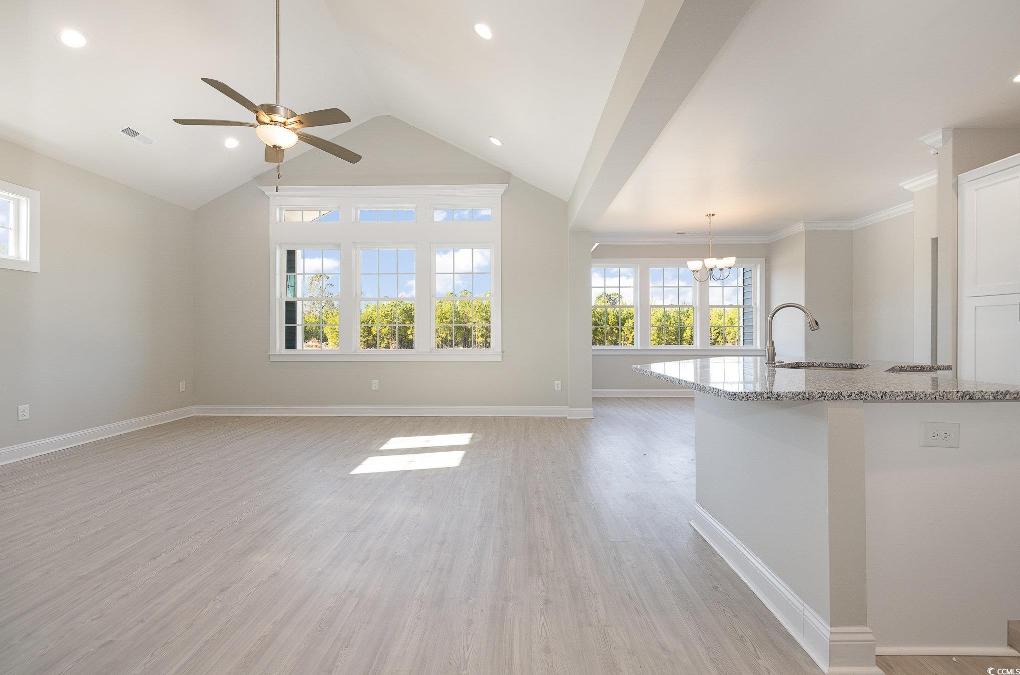381 Log Cabin Road Loris, SC 29569 - Photo 10 of 35 Kitchen with ceiling fan with notable chandelier,