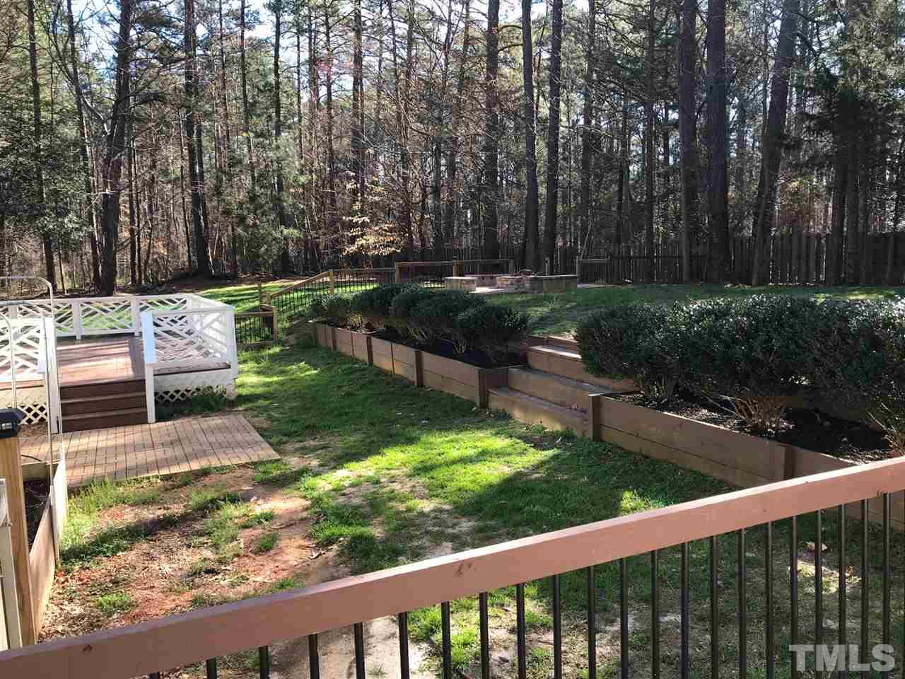 1416 Shadowview Court Raleigh, NC 27614 - Photo 23 of 28 a view of a backyard with sitting area