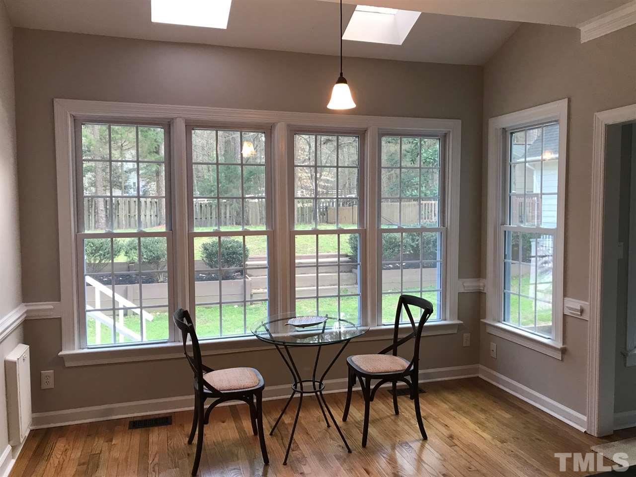 1416 Shadowview Court Raleigh, NC 27614 - Photo 7 of 28 a living room with furniture and a window