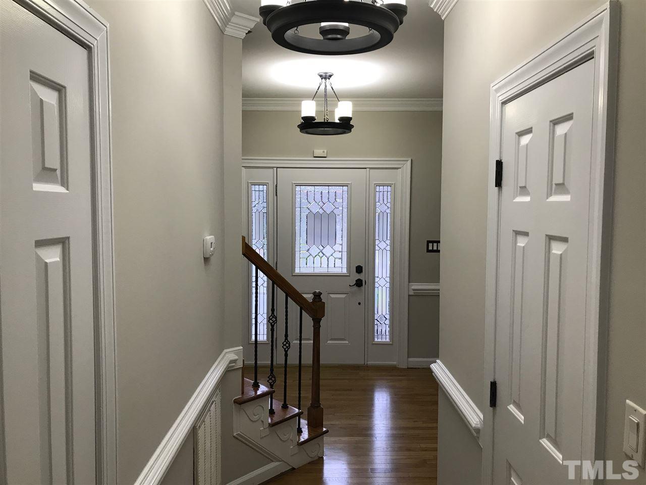 1416 Shadowview Court Raleigh, NC 27614 - Photo 8 of 28 a view of entryway with wooden floor