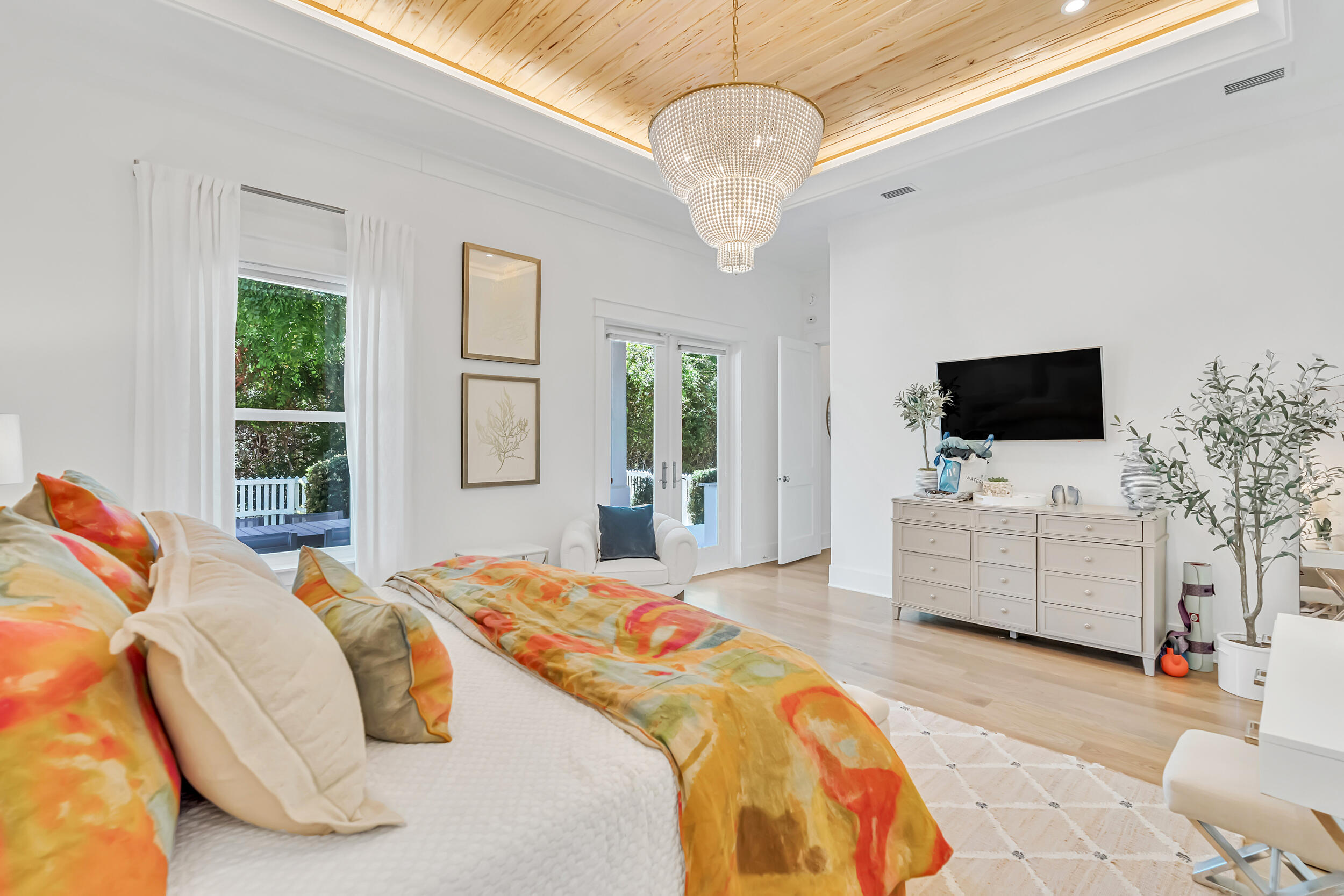 84 Pine Crest Circle Inlet Beach, FL 32461 - Photo 32 of 74 a spacious bedroom with a bed and a flat screen tv