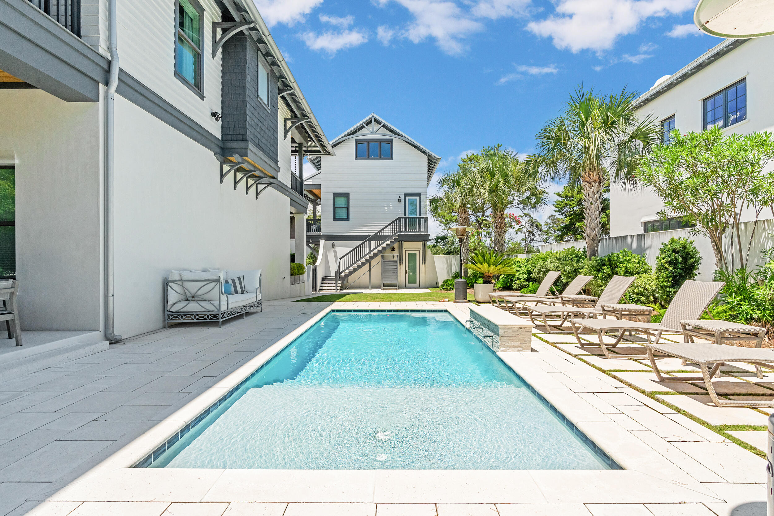 84 Pine Crest Circle Inlet Beach, FL 32461 - Photo 36 of 74 a view of swimming pool with lounge chair