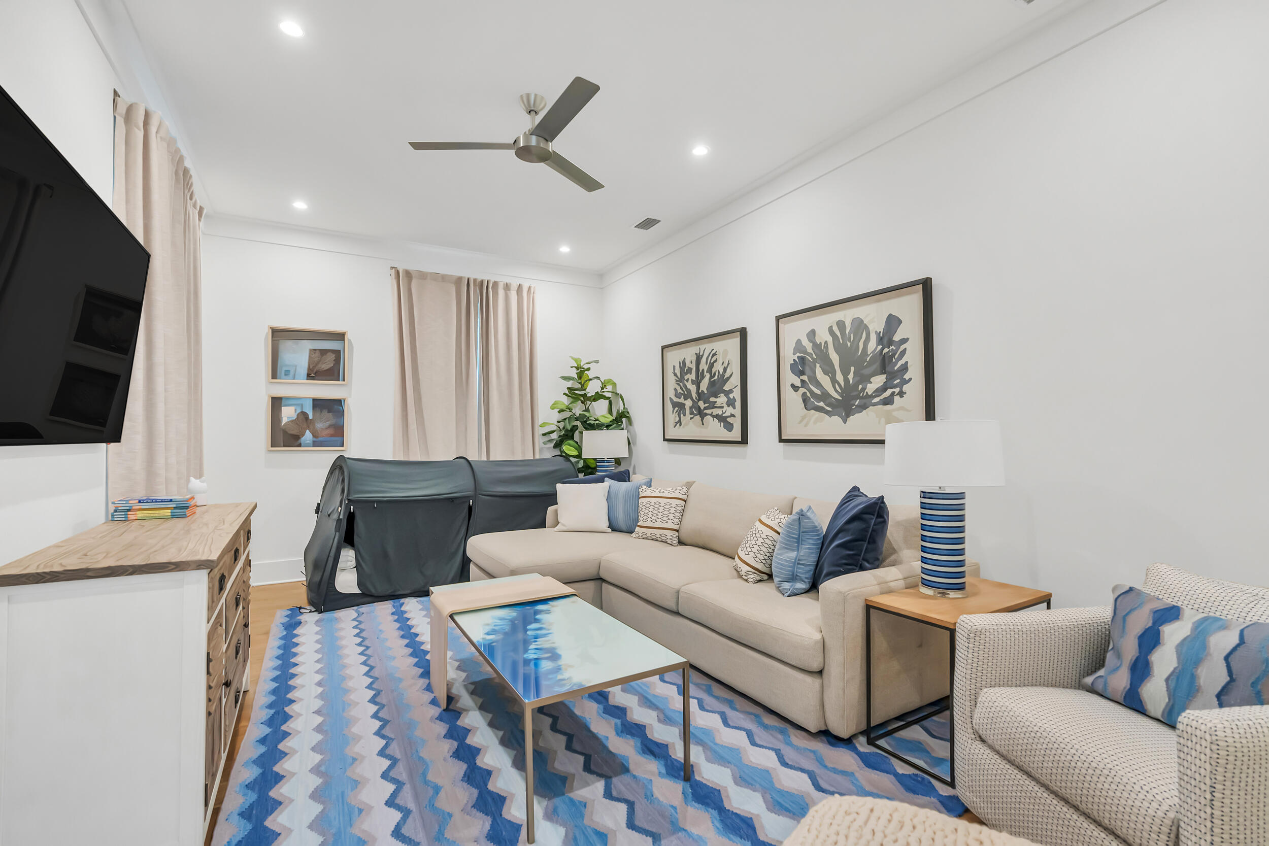 84 Pine Crest Circle Inlet Beach, FL 32461 - Photo 40 of 74 a living room with furniture and a flat screen tv