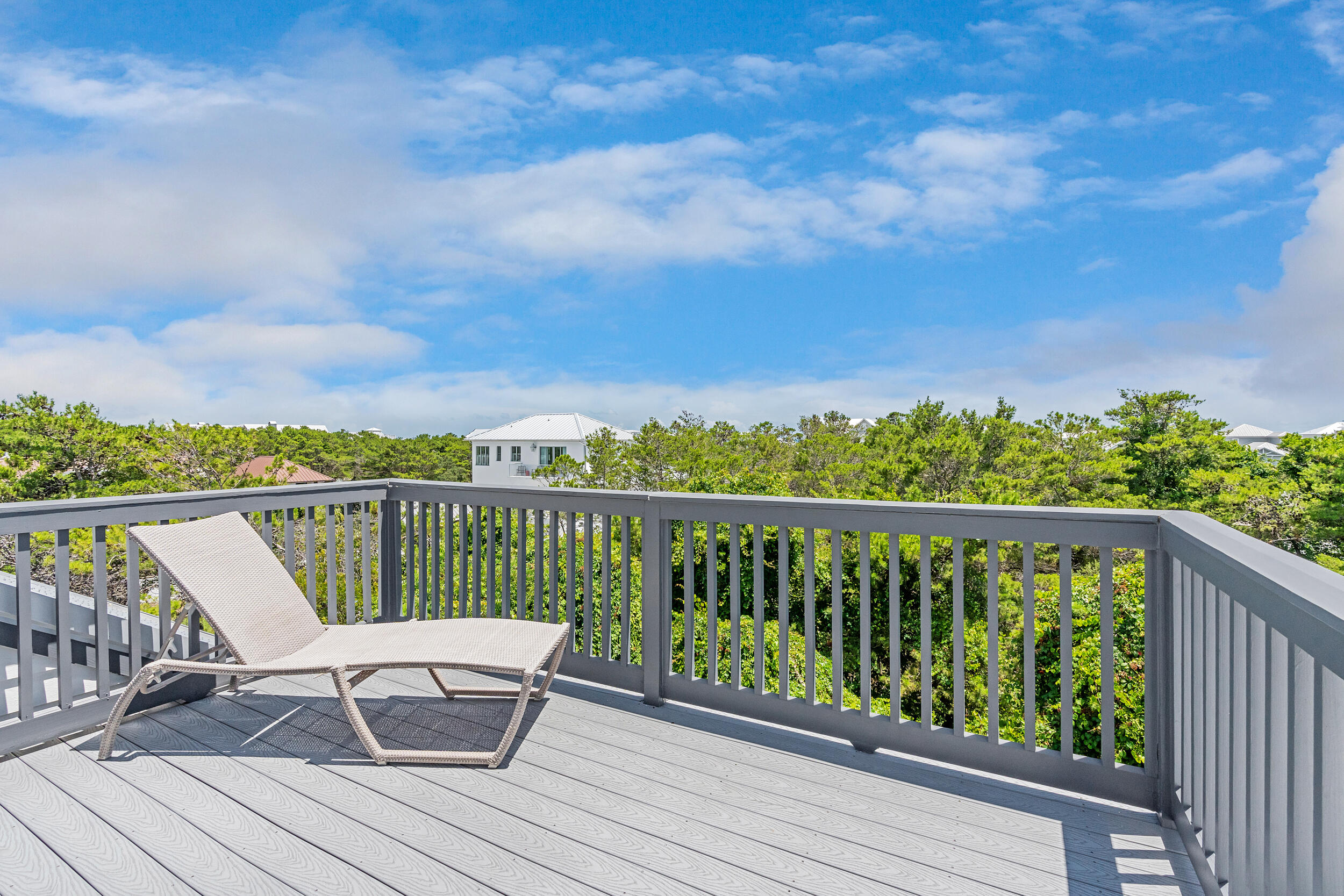 84 Pine Crest Circle Inlet Beach, FL 32461 - Photo 42 of 74 a view of a balcony with wooden floor