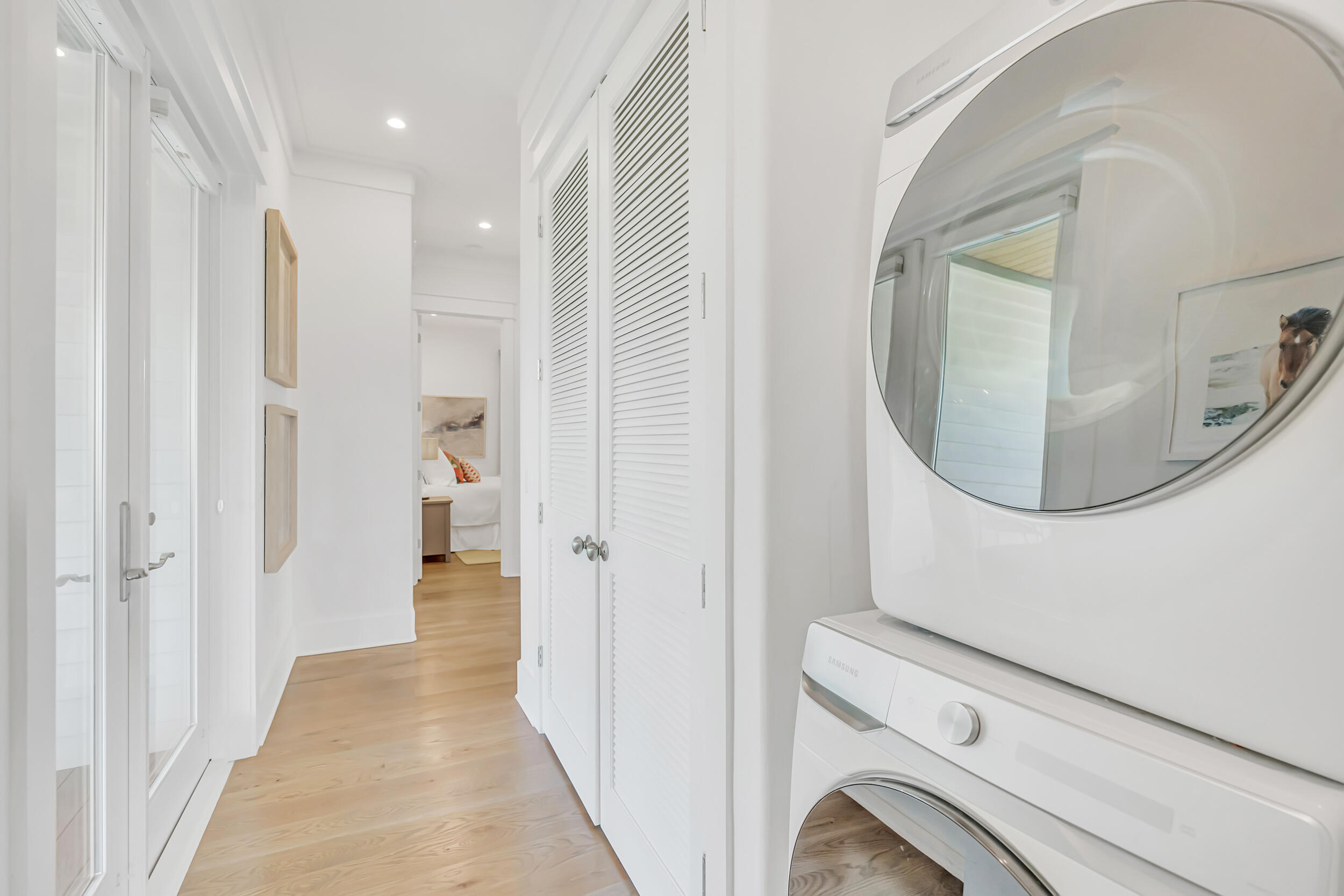 84 Pine Crest Circle Inlet Beach, FL 32461 - Photo 44 of 74 a view of a hallway with washer and dryer